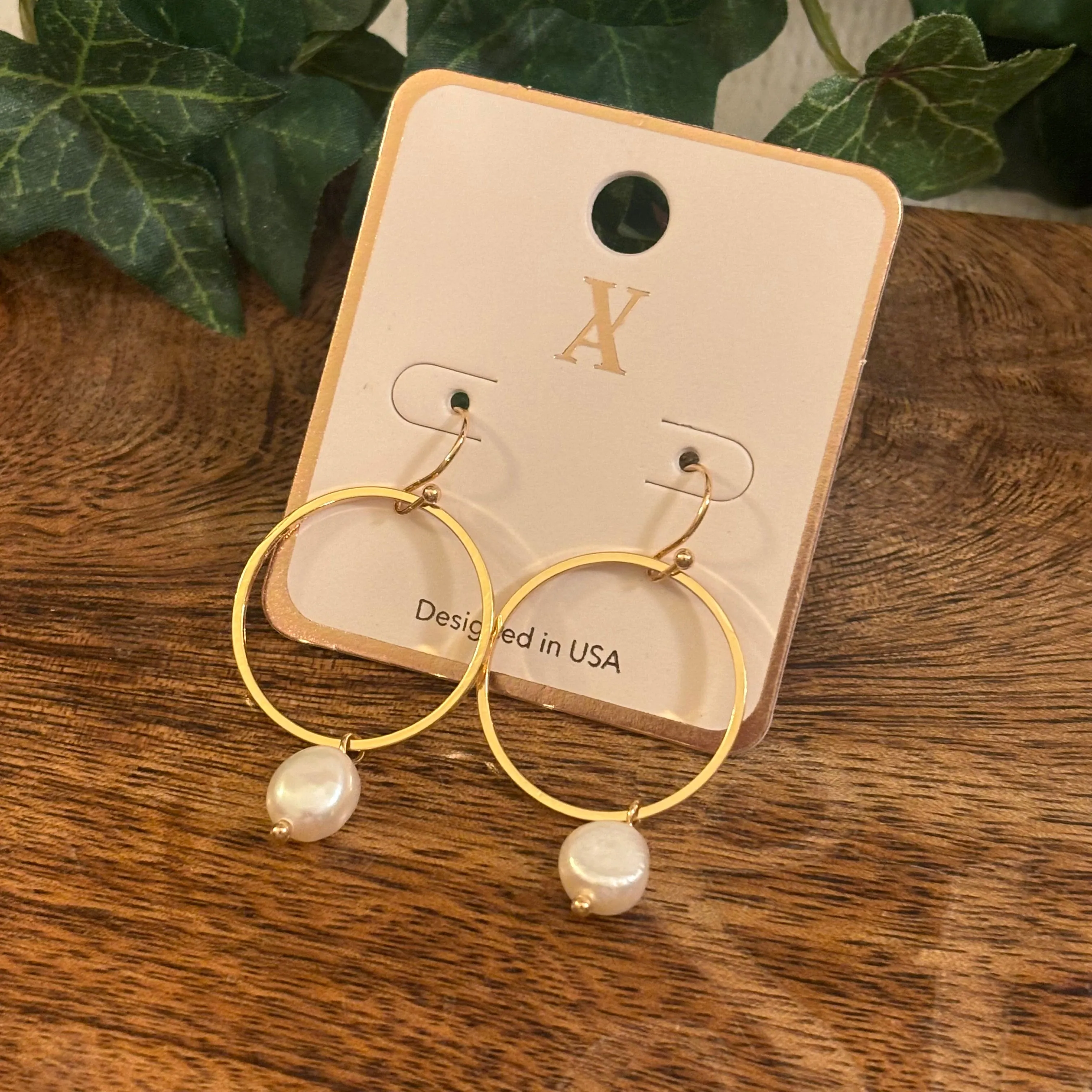 Gold Dangle Earrings Adorned with Pearls