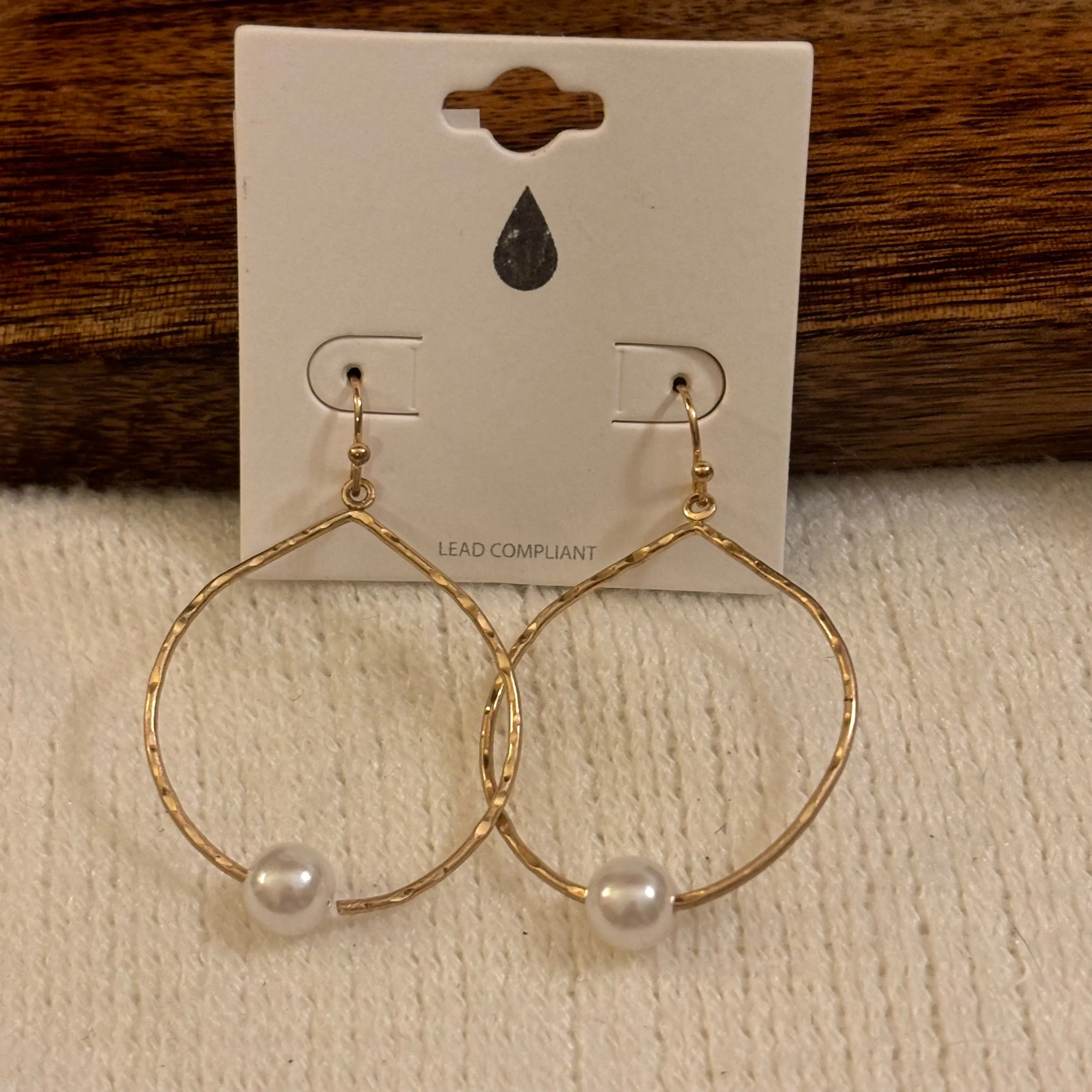 Gold Dangle Earrings Adorned with Pearls