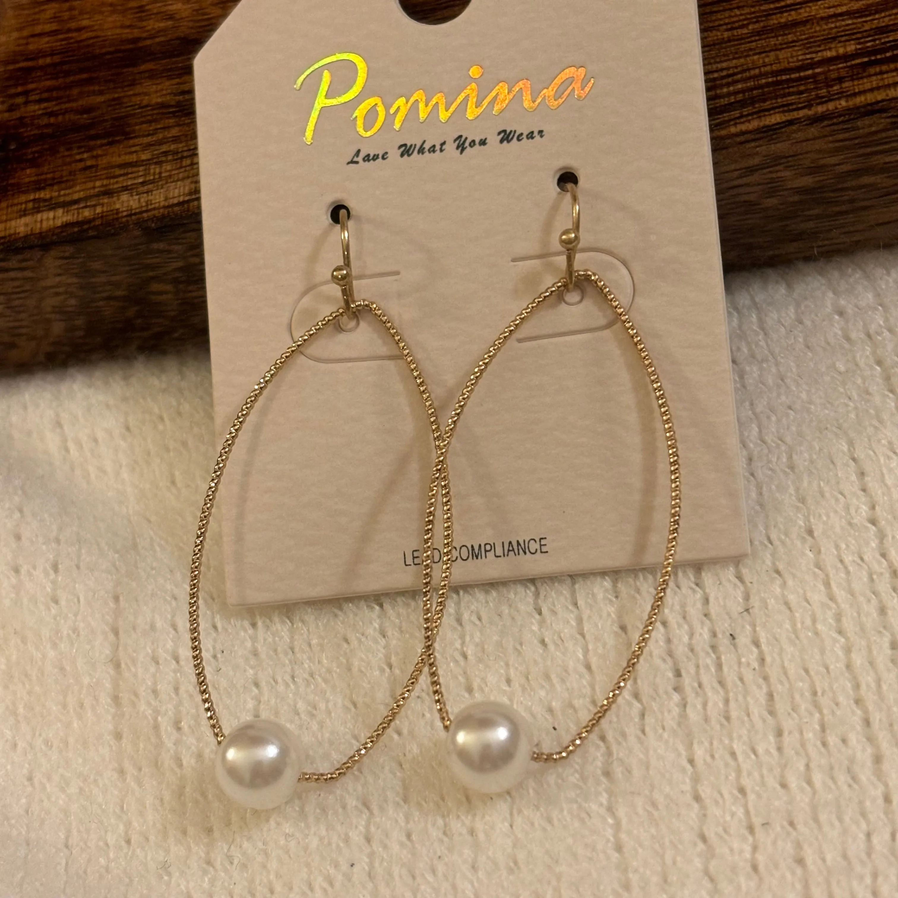 Gold Dangle Earrings Adorned with Pearls