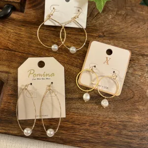 Gold Dangle Earrings Adorned with Pearls